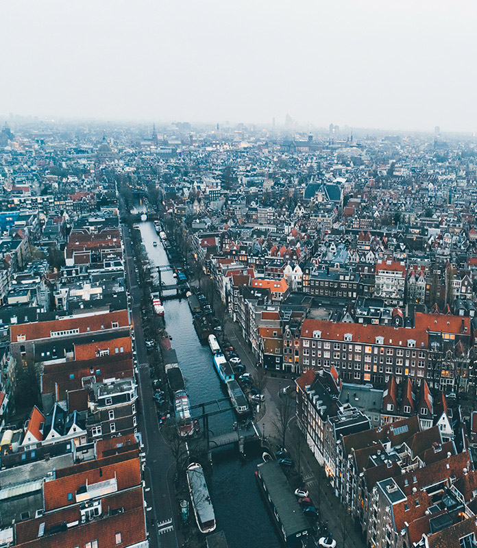 Amsterdam.Flying over european city.